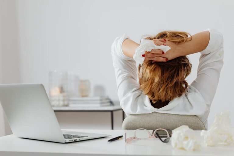 female employee exhausted in her job